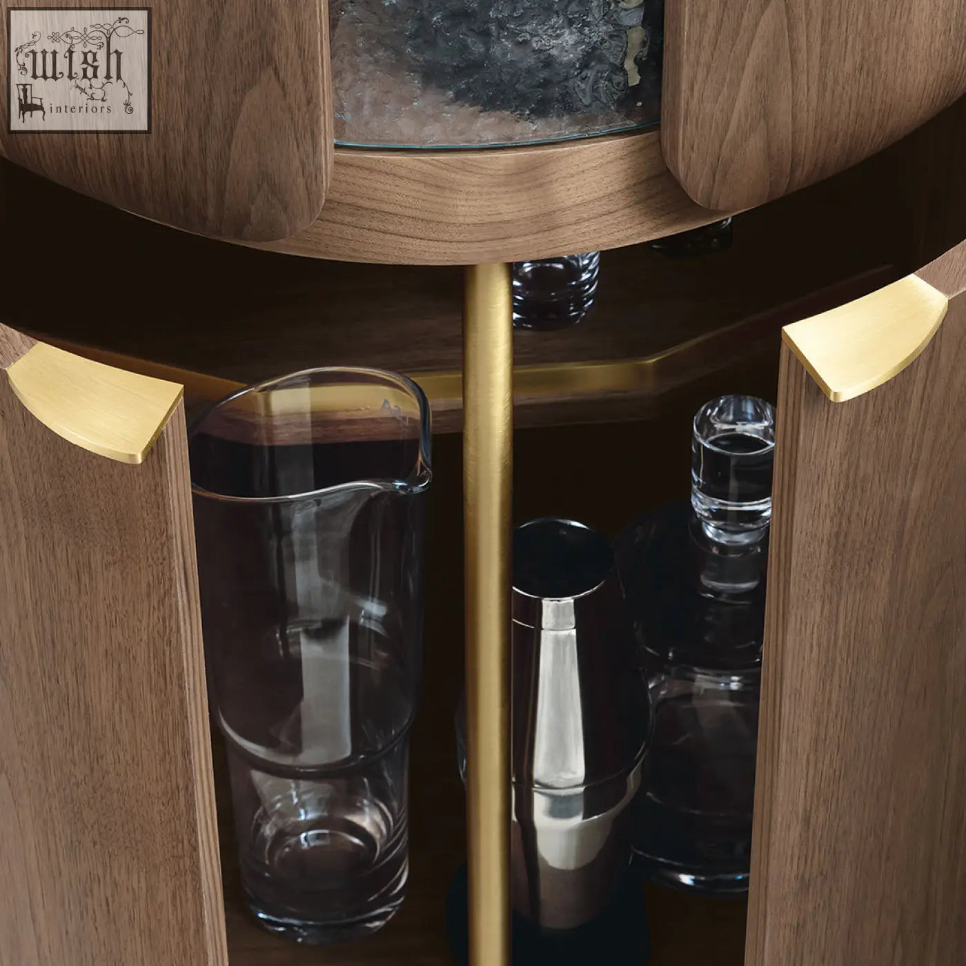 A sleek modern sakamoto liquor cabinet with walnut wood doors and polished brass handles for wine storage