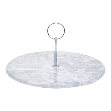 A sleek grey marble cake stand with a polished silver handle perfect for serving desserts in style