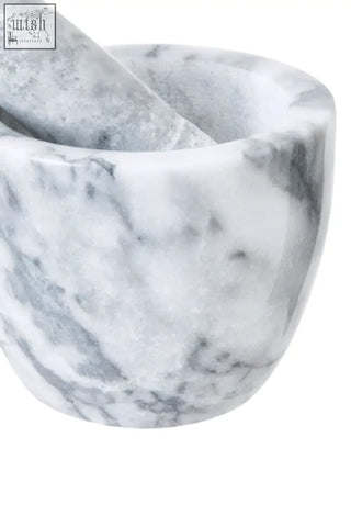 A grey marble tapered mortar and pestle set with natural stone veining in white and grey marble tapered design