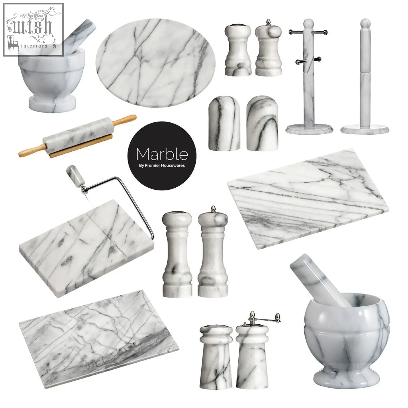 Salerno white marble cheese board with slicer shown with gray veining and kitchen tools like mortar pestle and rolling pin