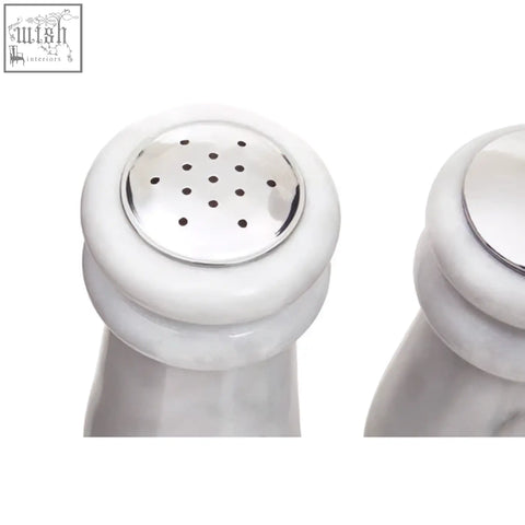 White ceramic salt and pepper shakers with polished silver tops in the salerno white marble salt and pepper set