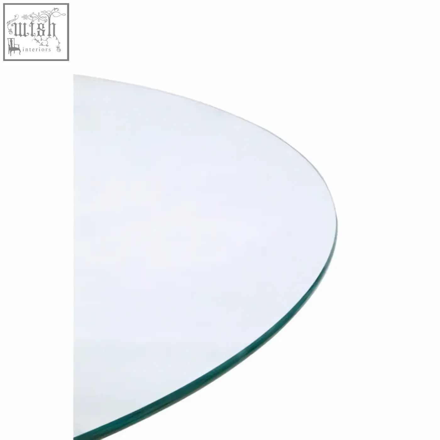 Clear glass tabletop with smooth curved edge on salford round dining table with black metal legs