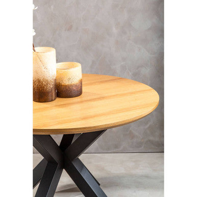 Salford wood veneer round dining table with black metal legs and x-shaped metal base for modern dining spaces