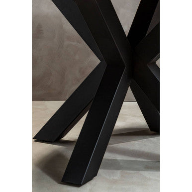Black metal legs with a modern x-shaped cross design on the salford wood veneer round dining table