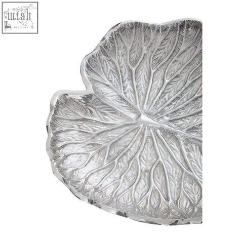 Silver finish lotus leaf plate with intricate vein detailing and textured metallic look perfect for serving snacks
