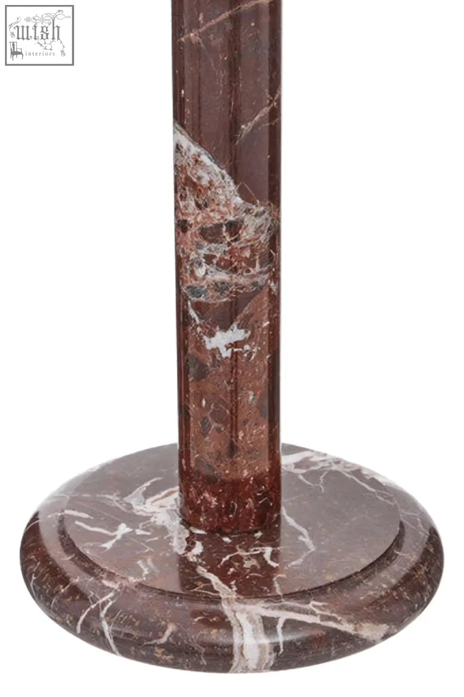 A tall slender salmo kitchen roll holder in dark brown marble with white veining on a matching circular base