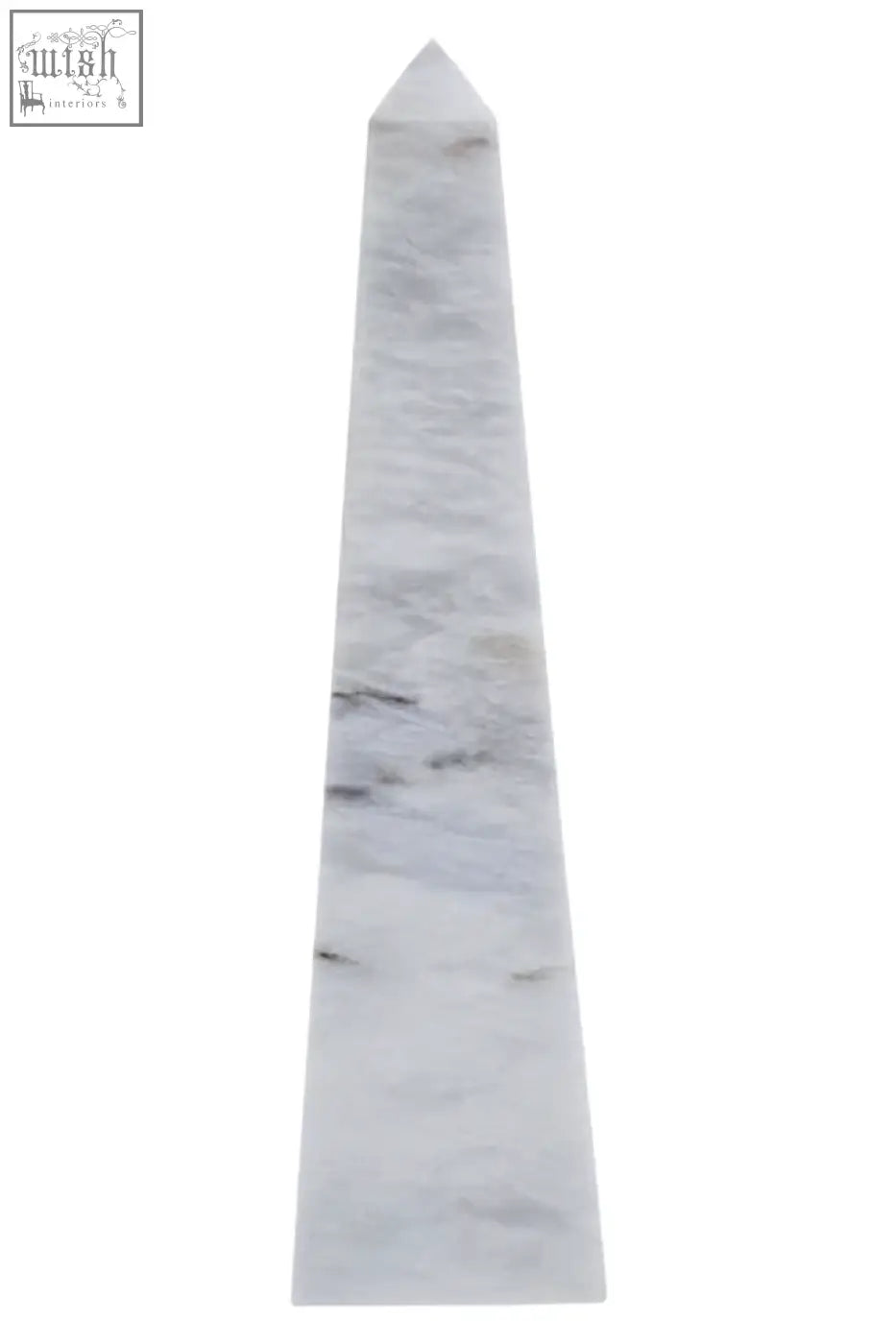 A sleek salmo large white marble obelisk with subtle gray veining and a pointed top perfect for decor