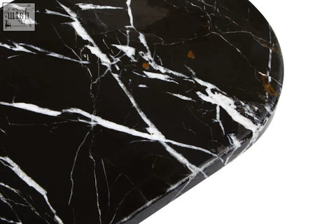 Salmo oval black marble chopping and serving board with striking white veining and subtle golden flecks on black marble