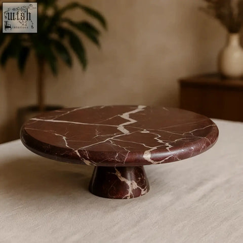 Salmo red marble cake stand with dark brown marble, white veining, and a sturdy pedestal base for elegant display