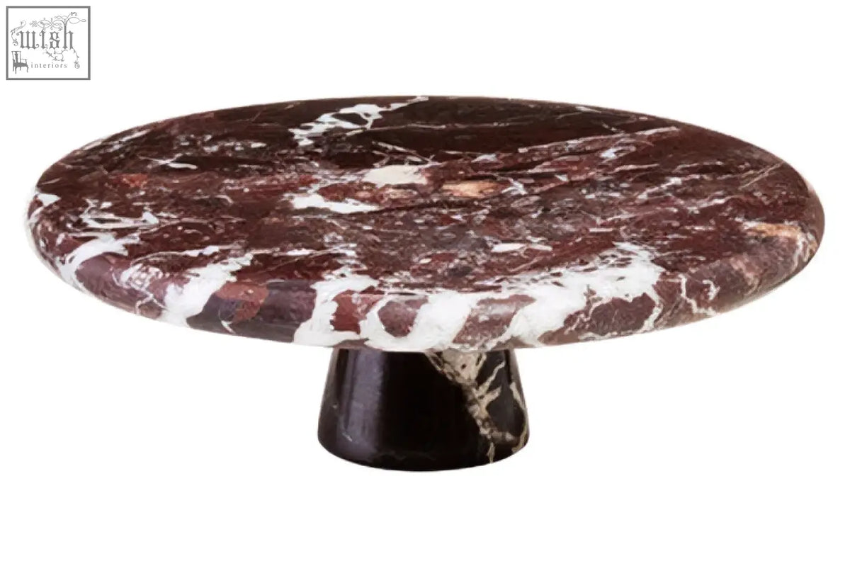 Salmo red marble cake stand with a round dark burgundy marble top and sleek black pedestal base for serving
