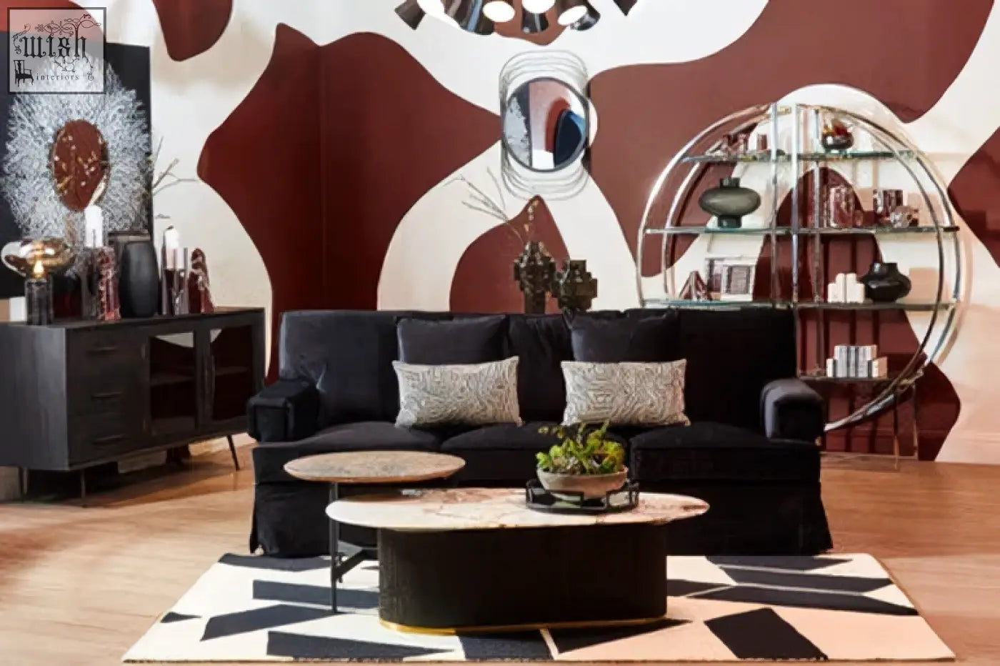 Black velvet sofa with silver patterned throw pillows beside a salmo red marble wine cooler with red marble wine design