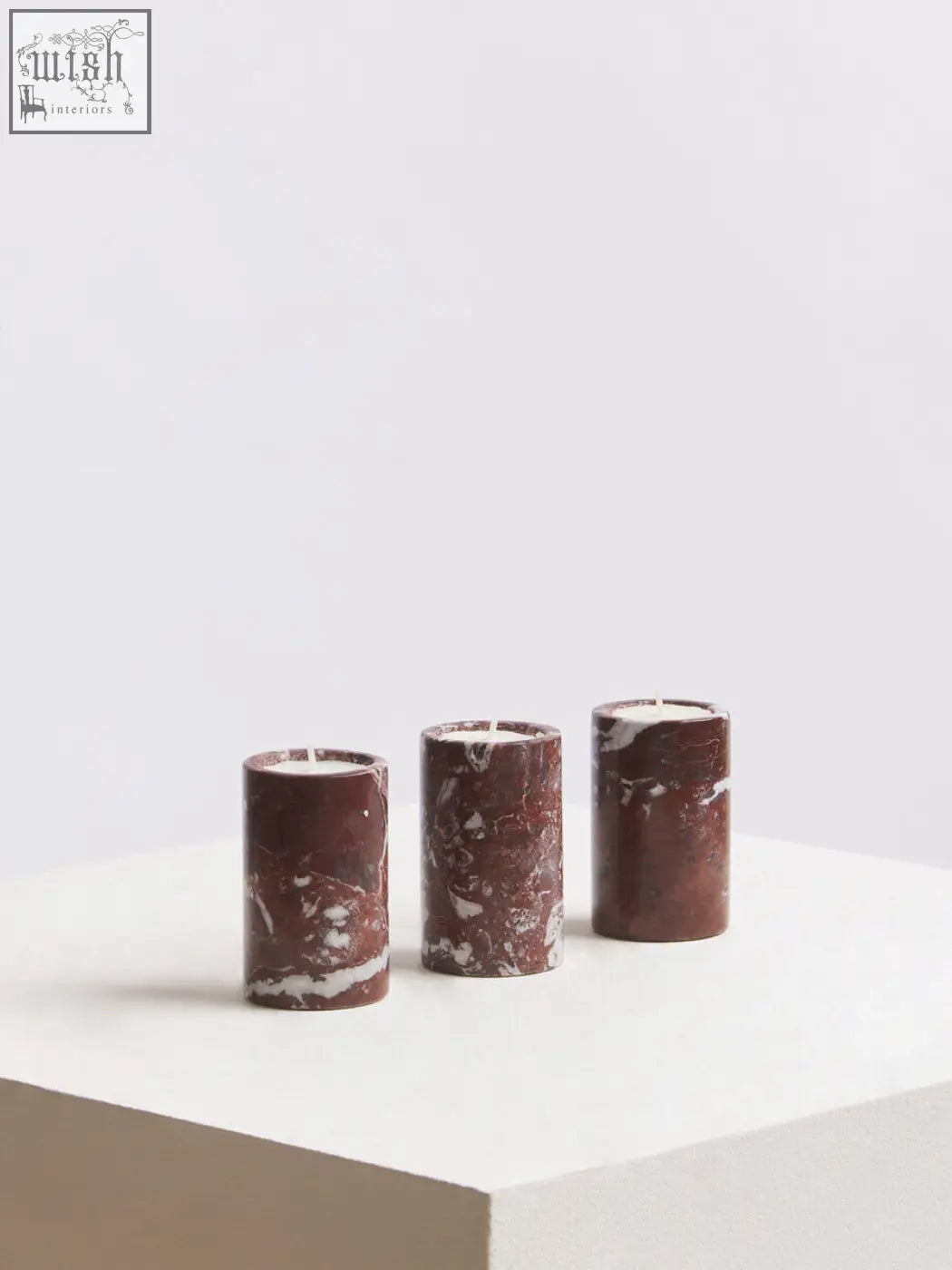 Salmo set of three red marble tealight holders made from polished stone with burgundy and white marble pattern