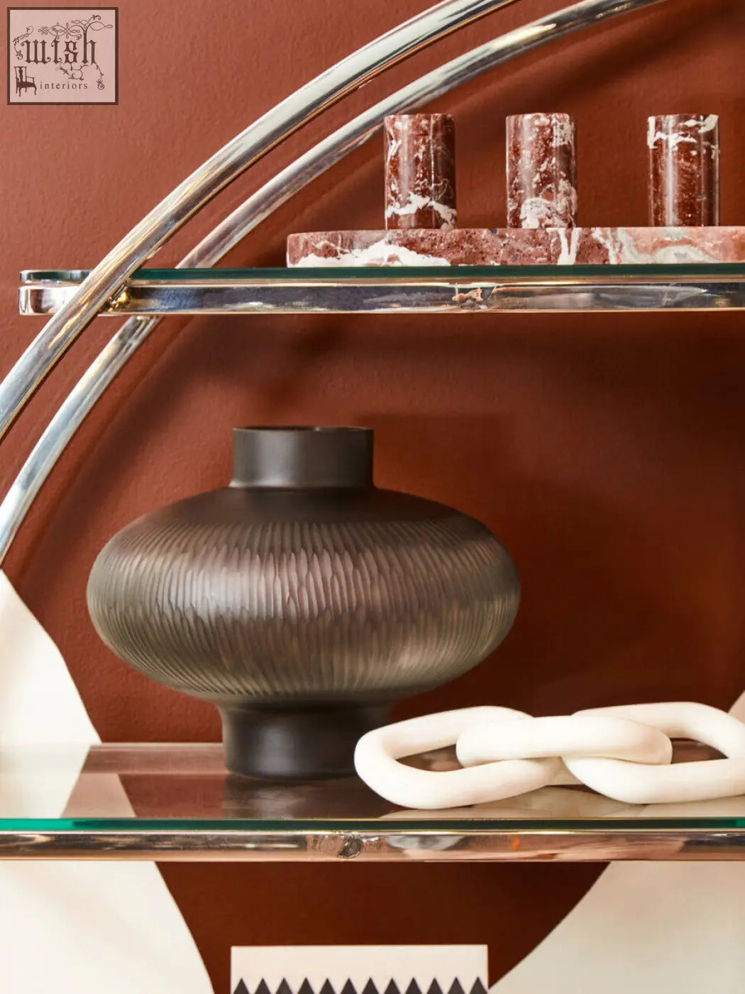 Dark gray ribbed ceramic vase with sleek rounded body and narrow neck in salmo set of three red marble tealight holders