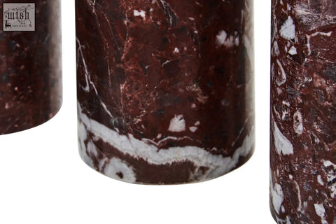 Salmo set of three red marble tealight holders in dark red marble with swirling white and black veining cylindrical design