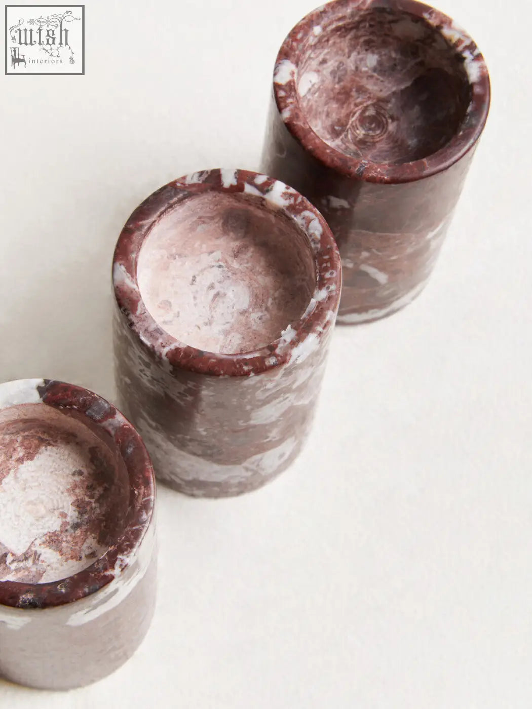 Three red marble tealight holders with burgundy and white veined pattern perfect for cozy decor