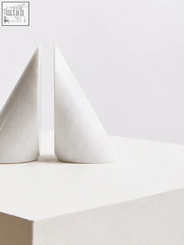 Salmo set of two white marble bookends in cone shape made of marble for stylish and functional bookshelf decor