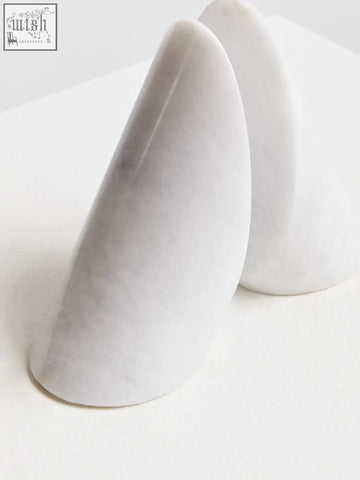 Salmo set of two white marble bookends with smooth polished surface and elegant teardrop shape perfect for shelves