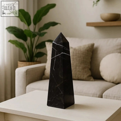 Salmo small black marble obelisk with glossy polished finish and white veining for elegant decor accents