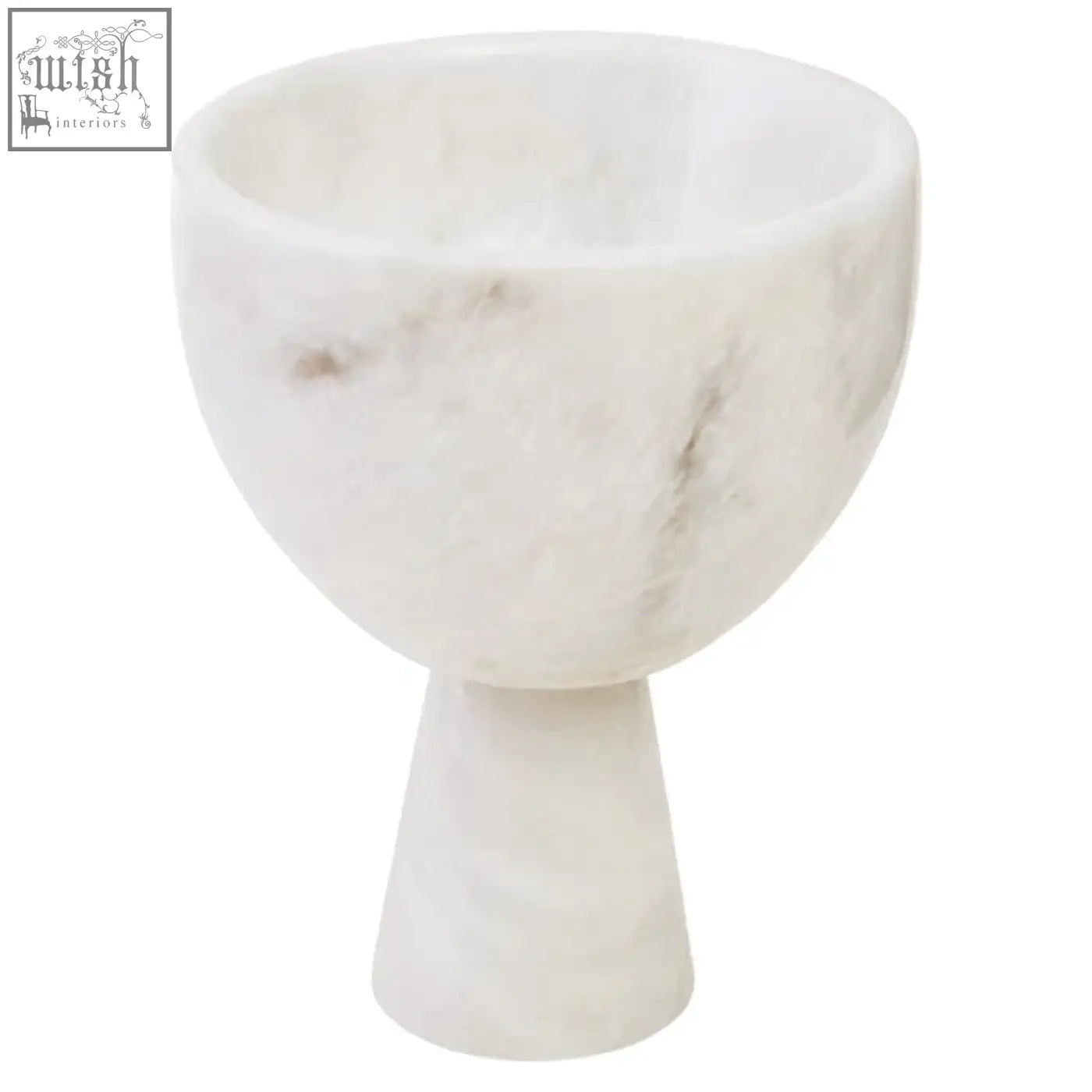 A salmo small white marble pedestal bowl with subtle gray veining and a rounded cup shape on a tapered base