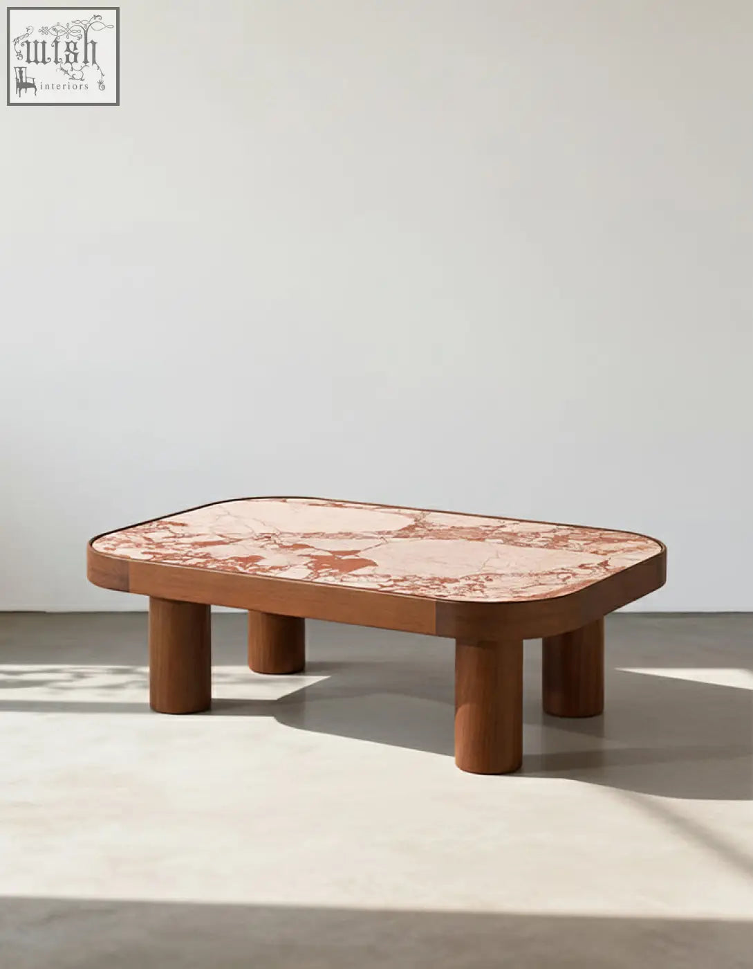 Salvatore rectangle coffee table with warm wood frame and polished pink marble top featuring brown veining