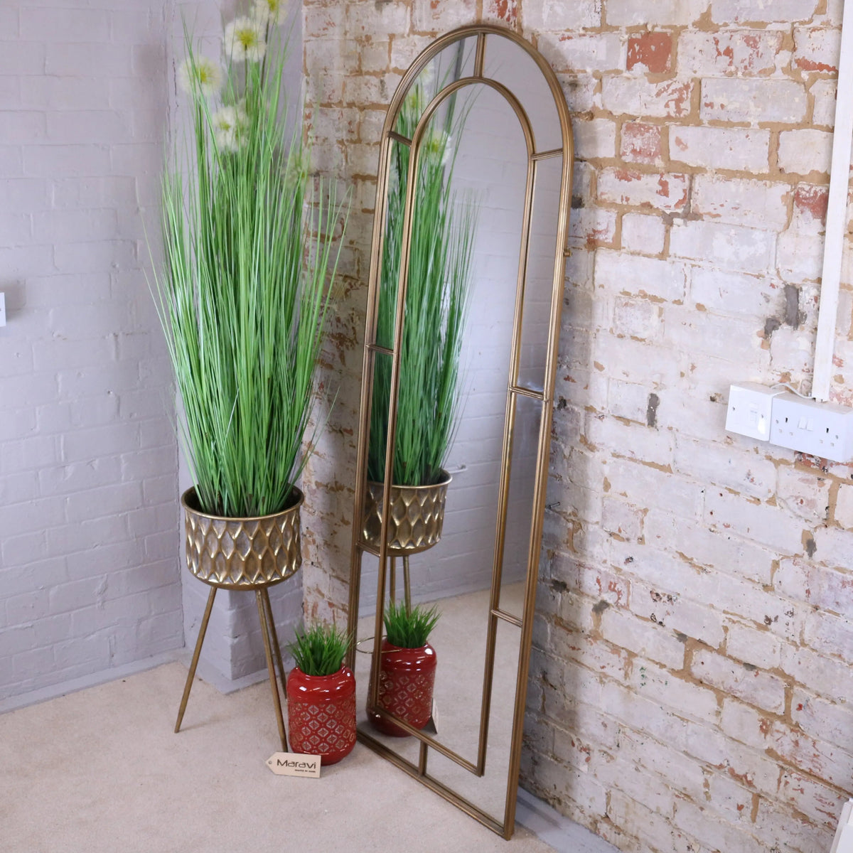 Samela full length arch mirror with gold frame and geometric paneling perfect length arch mirror for stylish spaces