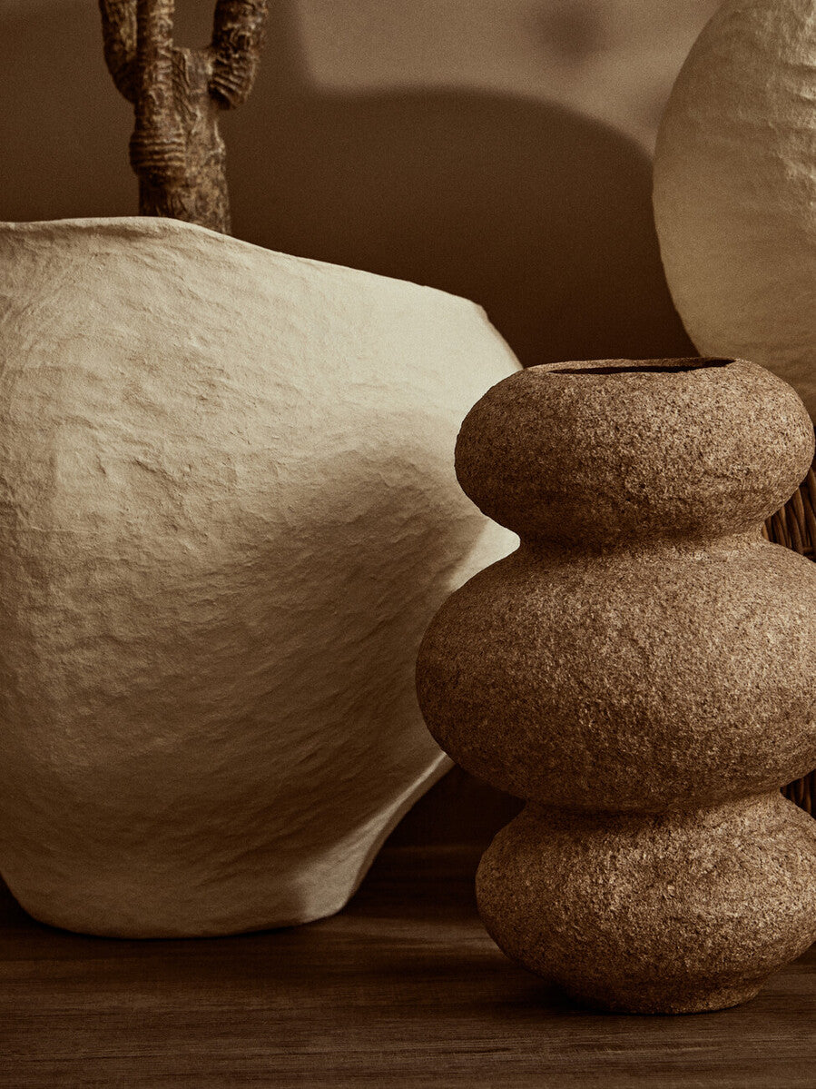 Earthy brown textured ceramic vase with stacked rounded segments in sanai cotton mache large beige planter