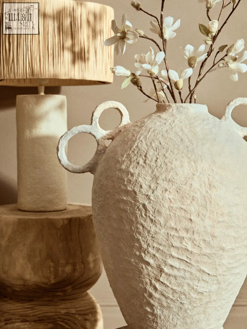 Cream-colored sanai cotton mache large vase with textured surface and decorative looped handles