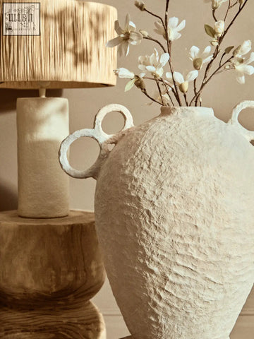 Cream-colored sanai cotton mache large vase with textured surface and decorative looped handles