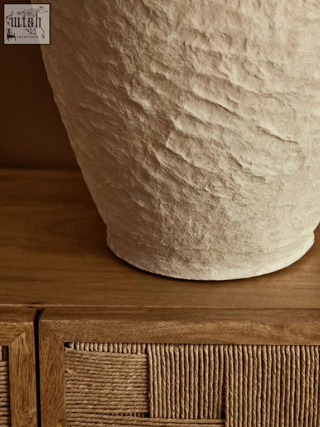 Cream-colored sanai cotton mache large vase with decorative handles and rustic handcrafted textured finish