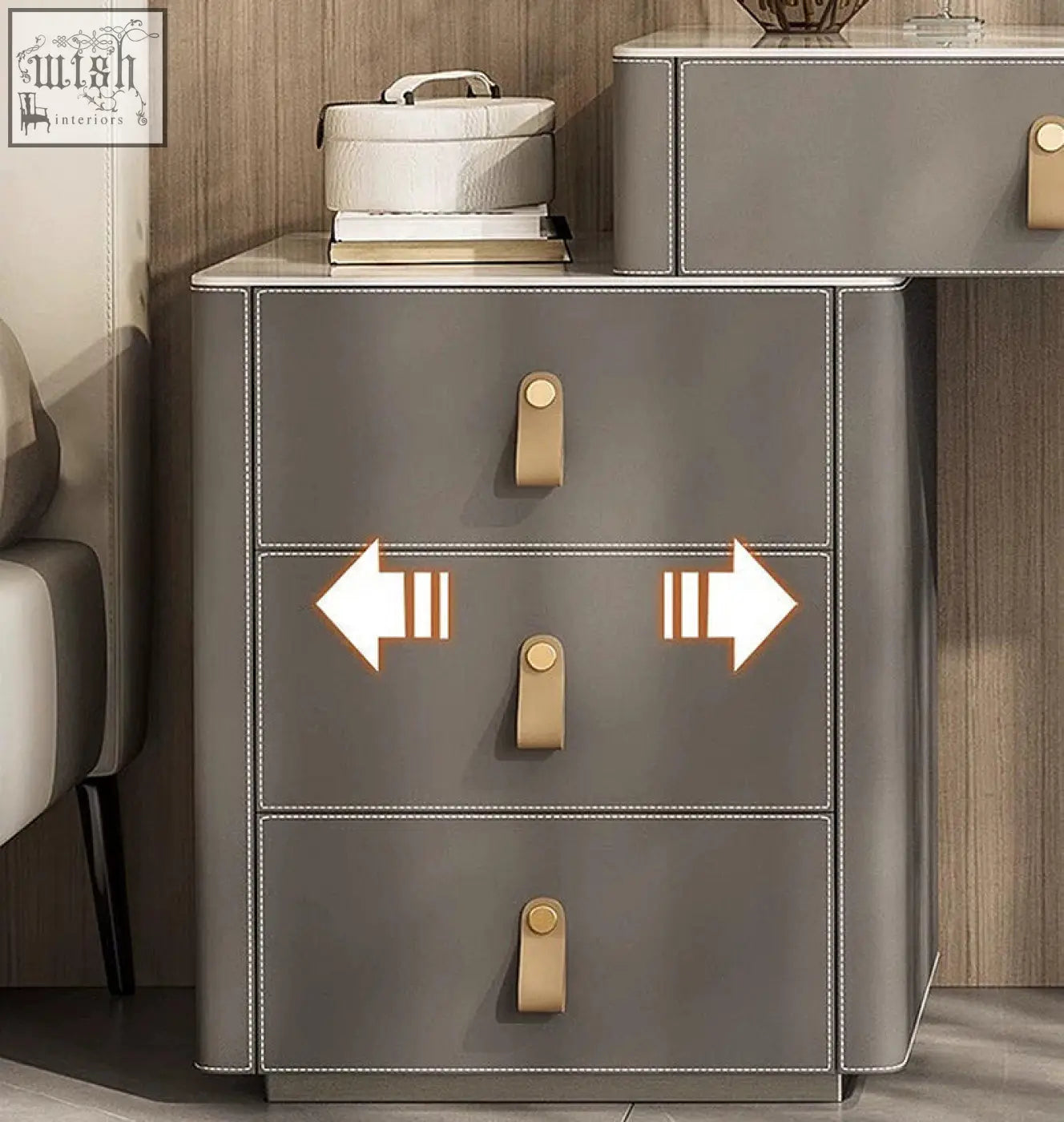 Grey faux leather dressing table nightstand with gold-tone handles and white stitching in sanchez vanity table