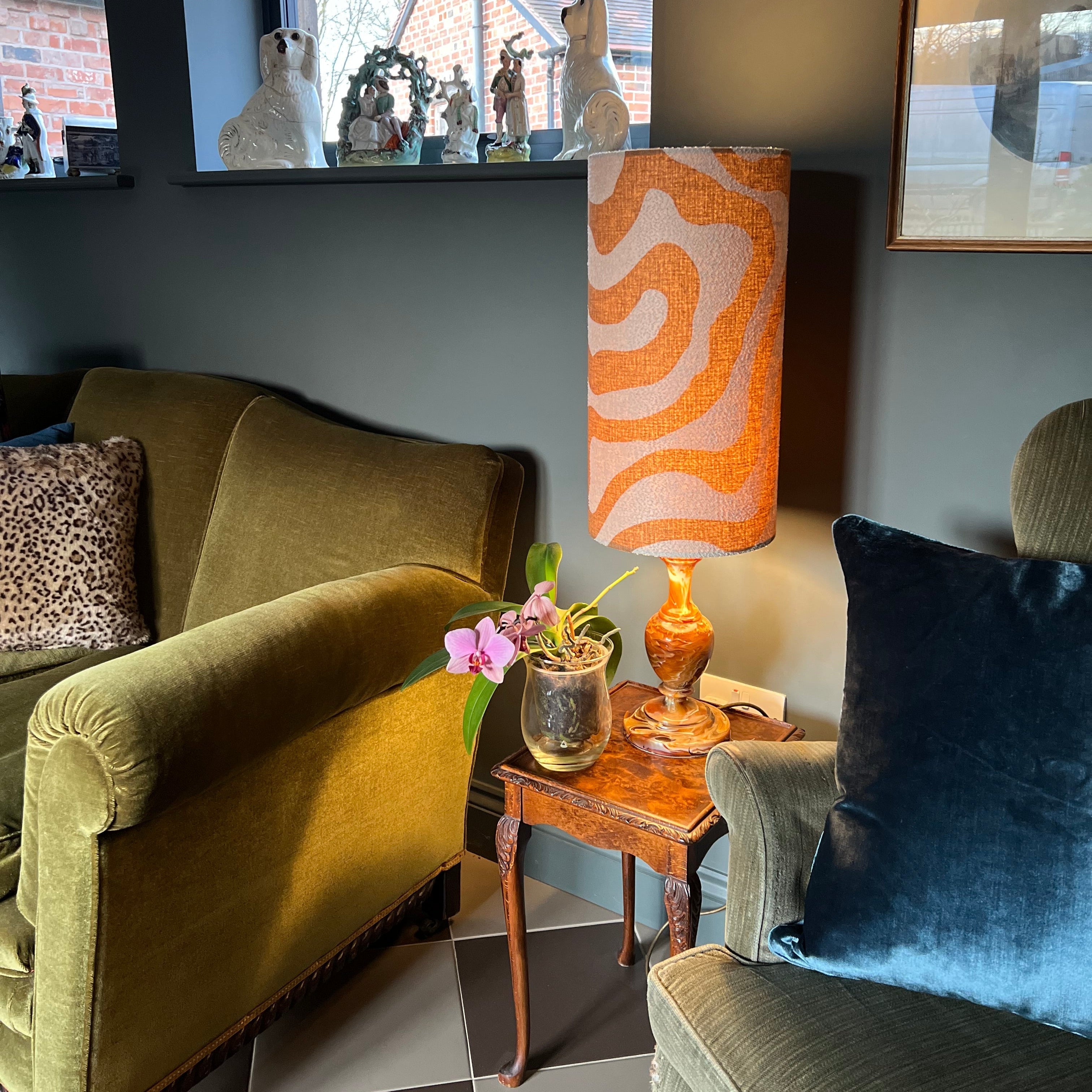 Orange and cream sandstone wiggle extra tall lampshade with polished wooden base and fitting sits 3-4cm