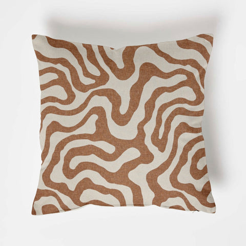 Square sandstone wiggle throw cushion with bold brown and cream wavy lines on textured fabric scatter cushion