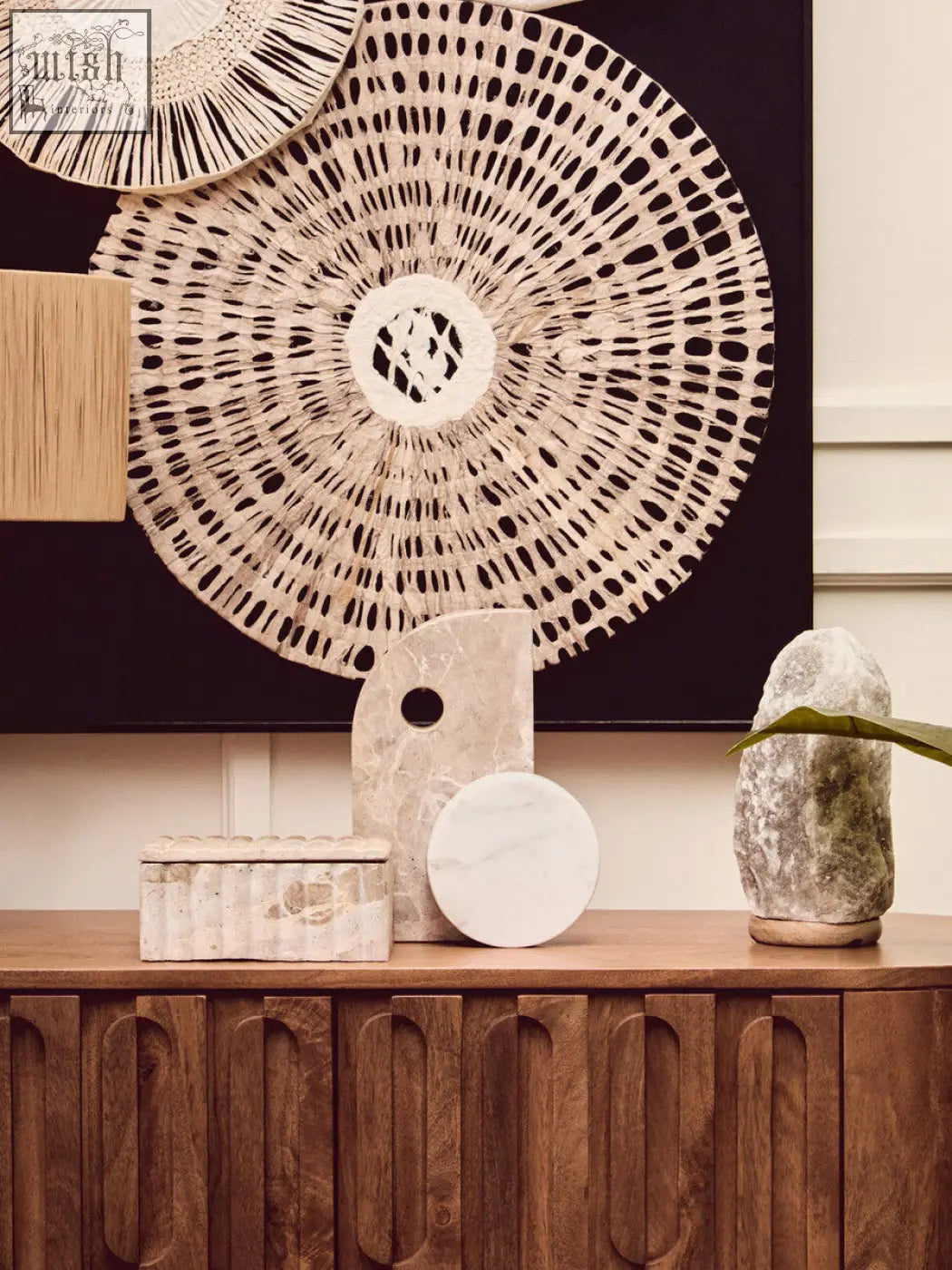 Beige woven circular wall art with geometric pattern and natural fiber texture next to santino rectangular chocolate marble box