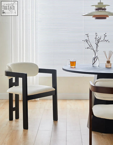 Black-framed sara dining chair with cream upholstered seat and backrest perfect for your coffee table set area