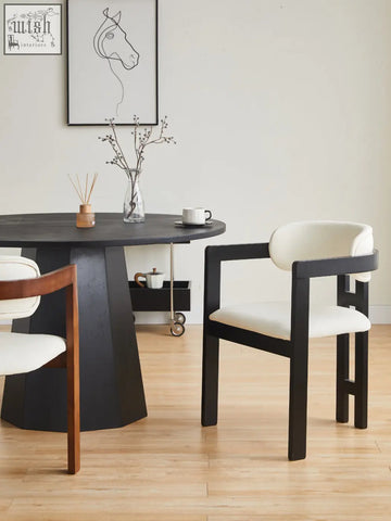 Black-framed sara dining chair with white upholstered seat and back perfect for your coffee table set or table set