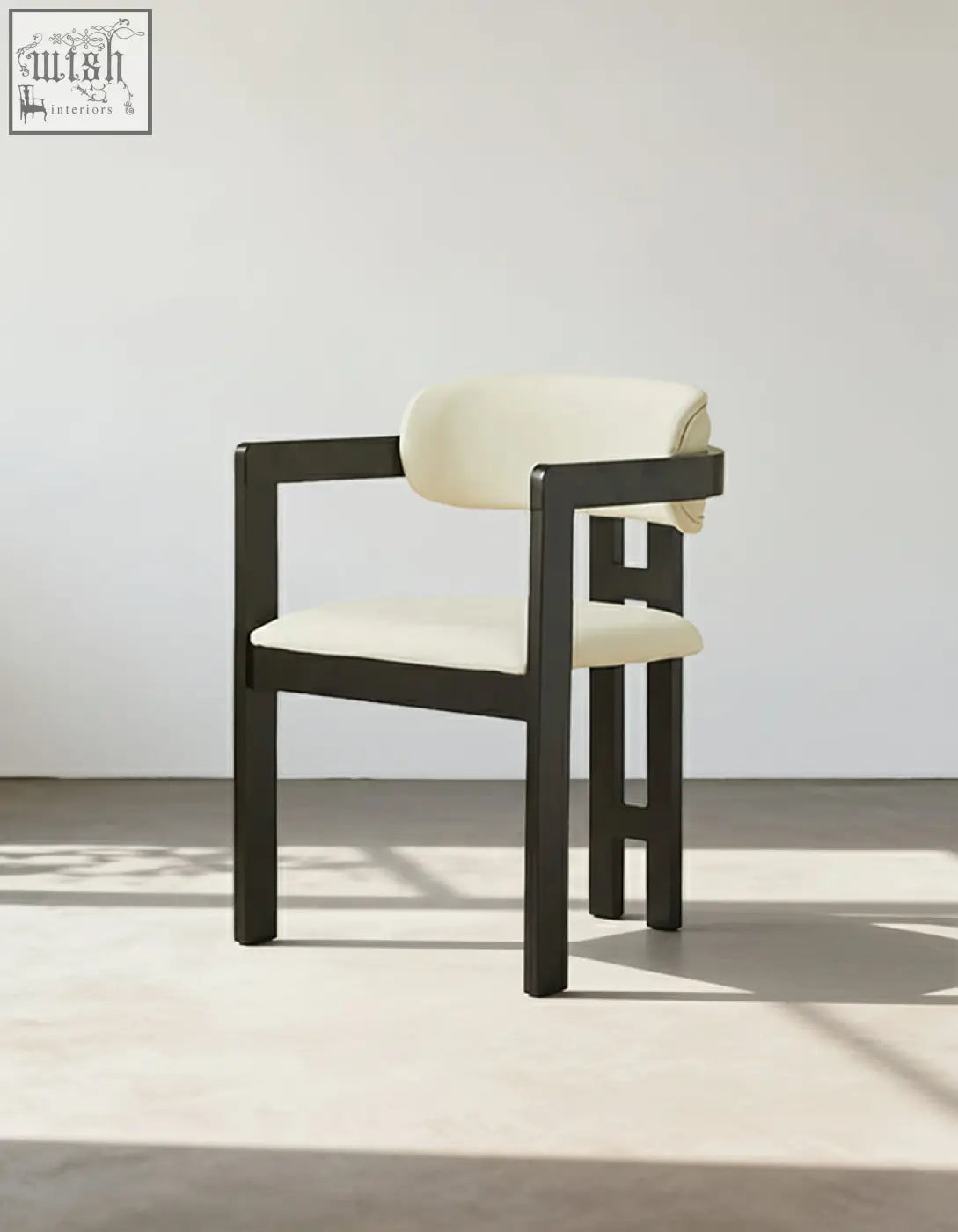 Sara dining chair with sleek black wood frame and cream upholstery perfect for stylish coffee table sets