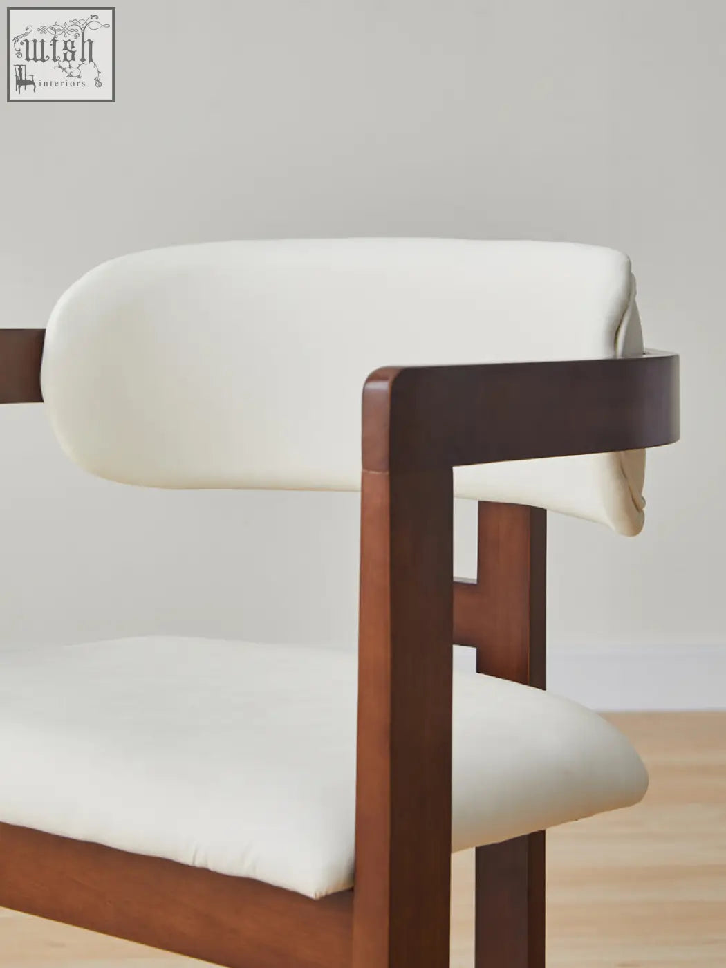 Modern sara dining chair with dark wood frame and white upholstered seat pairs well with coffee table set designs