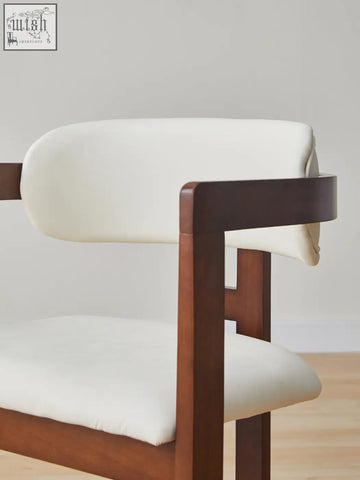 Modern sara dining chair with dark wood frame and white upholstered seat pairs well with coffee table set designs