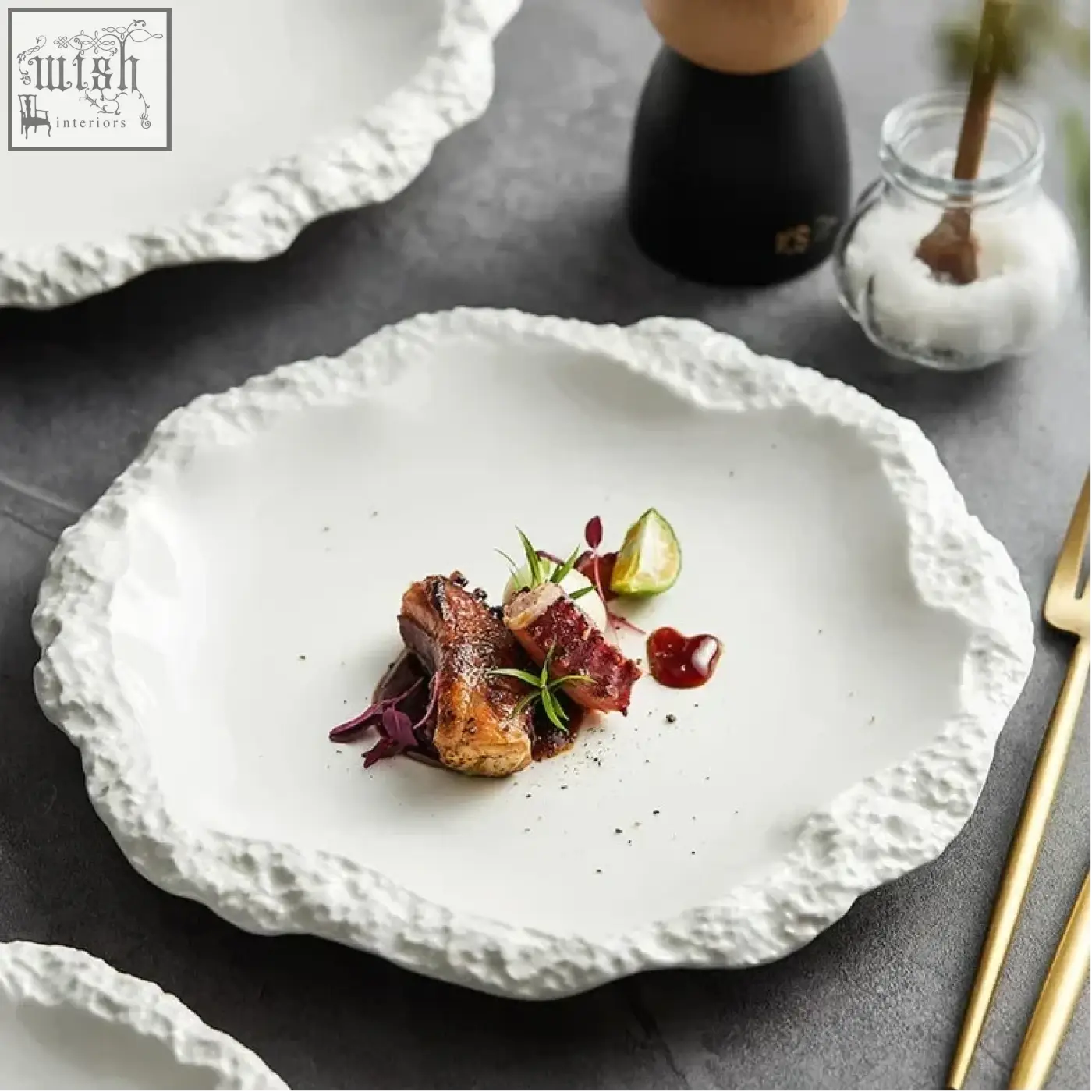 White ceramic sara plates with textured organic edge and white glaze perfect for modern dining settings