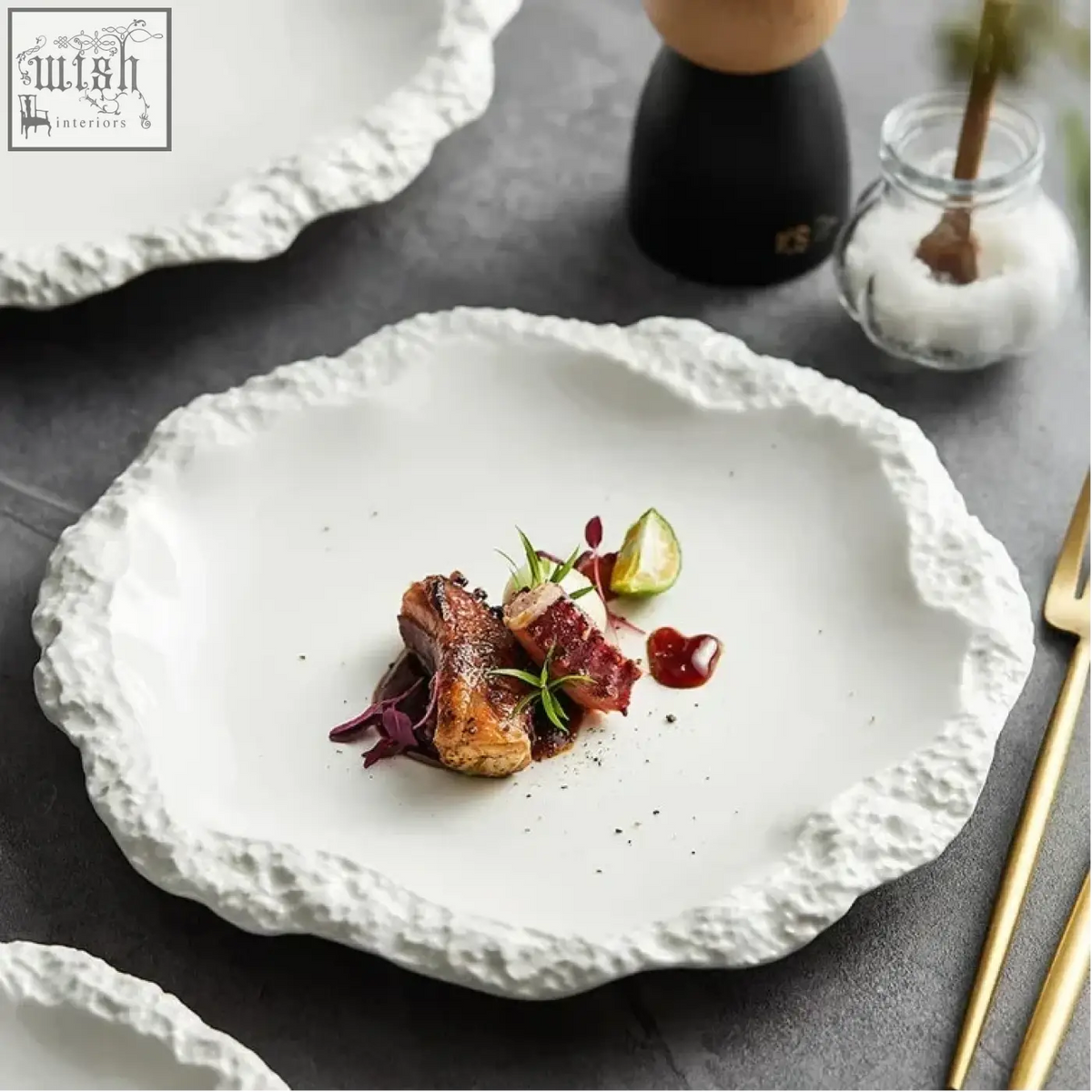 White ceramic sara plates with textured organic edge and white glaze perfect for modern dining settings