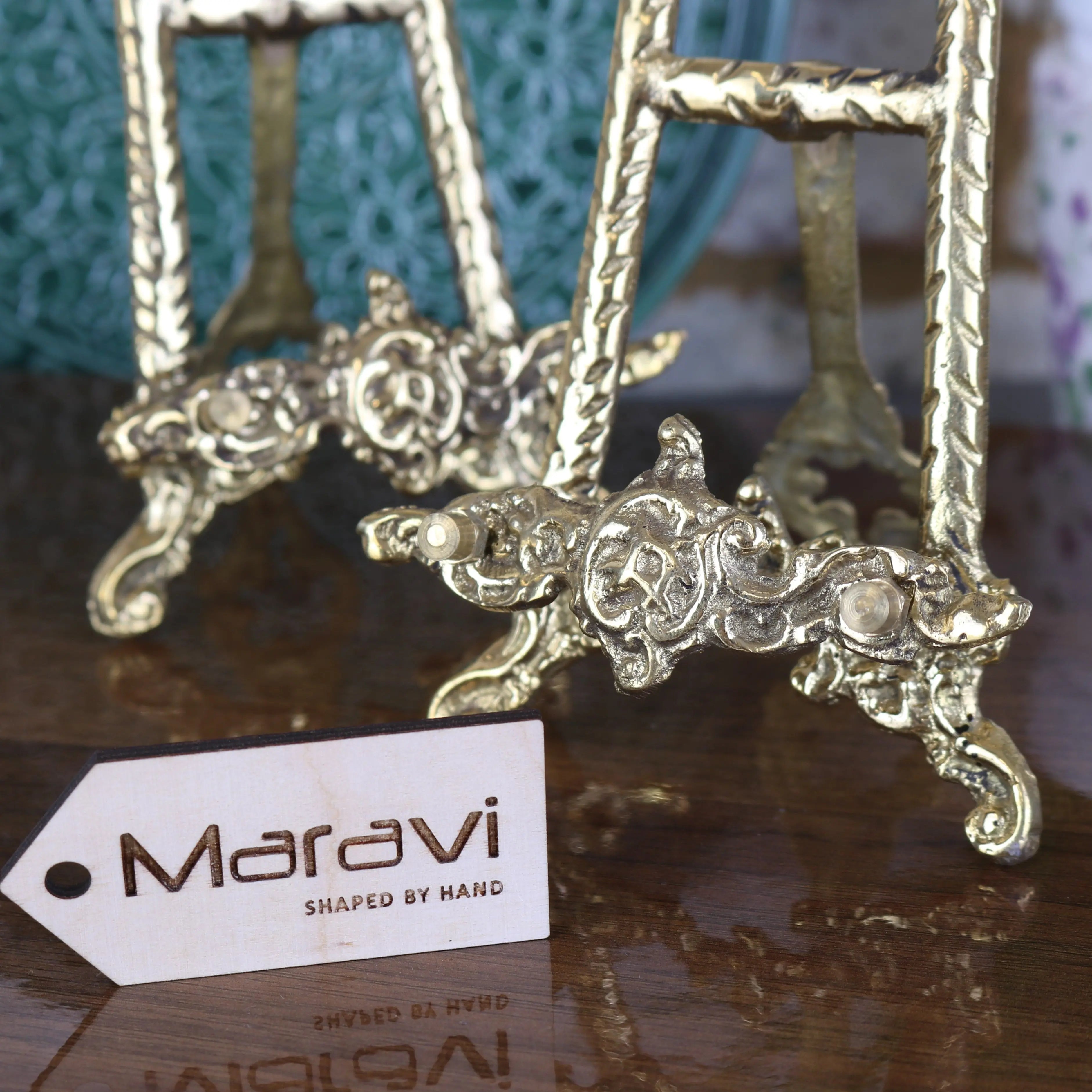 Antique-style gold-toned brass easel with intricate scrollwork and ornate feet from saramati 20cm brass set of 2