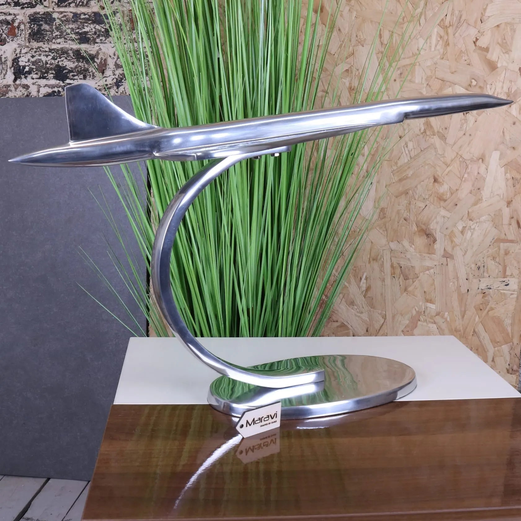 Shiny silver metallic saran concorde model airplane on a curved stand 71cm perfect for display