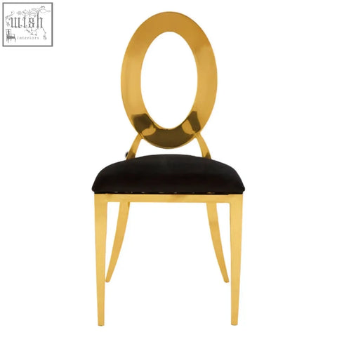 Gold finished metal sarita stackable gold frame dining chair with black velvet seat and oval backrest