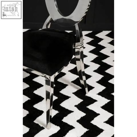 Sarita stackable silver frame dining chair with sleek chrome frame and black velvet padded seat for modern dining