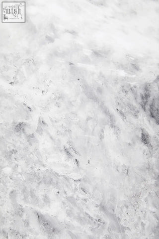 White marble surface with subtle grey veining on saronno grey marble coffee table top