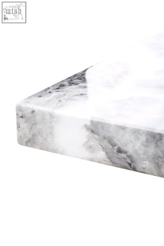 White and grey marble dining table with polished smooth surface perfect for stylish grey marble dining rooms