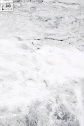 Saronno grey marble dining table featuring a white marble surface with subtle grey veining for elegant dining