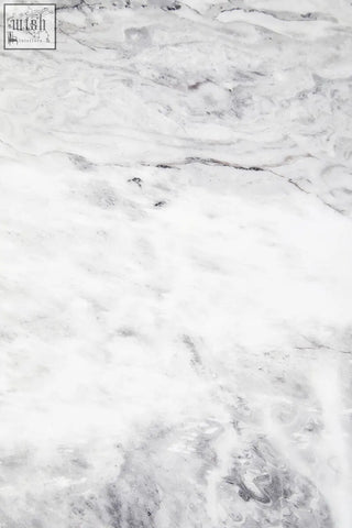 Saronno grey marble side table with white grey marble surface and swirling veining on stainless steel base