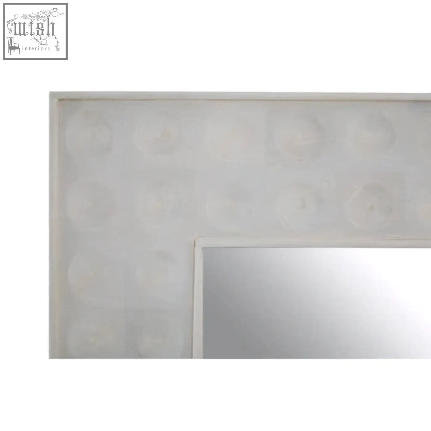 Rectangular satara wall mirror with off-white textured frame featuring subtle circular indentations for stylish decor