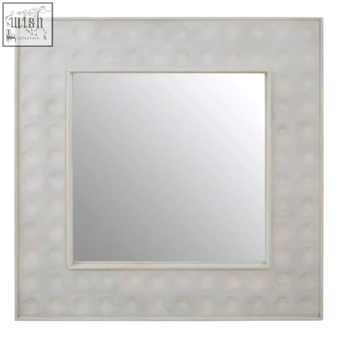 Silver-toned satara wall mirror with a square hammered metal frame featuring circular indentations for wall decor